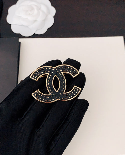 18K  Chanel Black Brooch